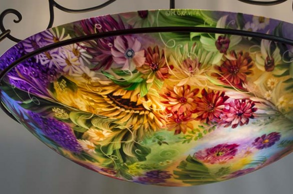 Romantic Flowers of New Orleans is a 44 inch commissioned reverse hand painted glass chandelier by artist Jenny Floravita.
