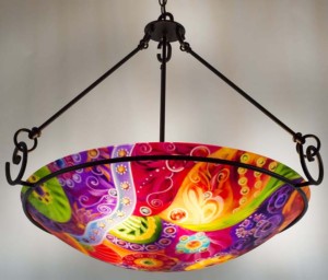 Sedona Trail is a hand painted chandelier by Jenny Floravita. Forged fixture shown here is Floravita's Contemporary Swirl and has a height of 29 inches as pictured. This fixture style also comes in shorter heights. Installation ready.